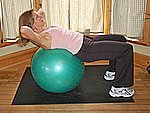 Starting position for this ab exercise with exercise ball. This is the beginner crunch.