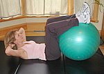 Basic crunch abdominal exercise with exercise ball